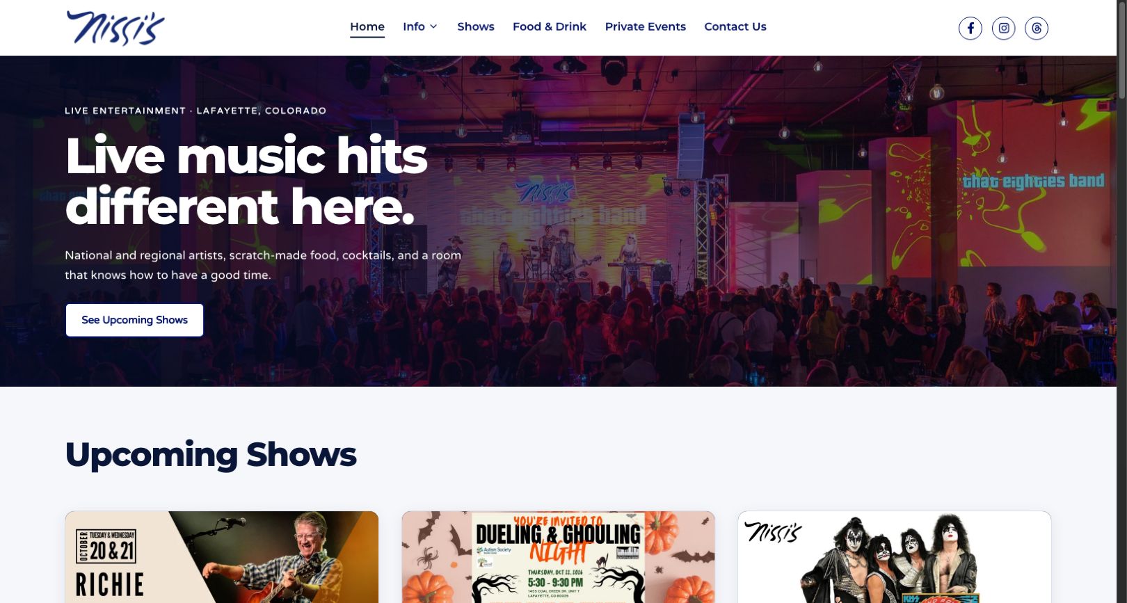 Nissi’s live homepage on October 20, 2026, showing the refreshed navigation, venue photograph, and upcoming shows